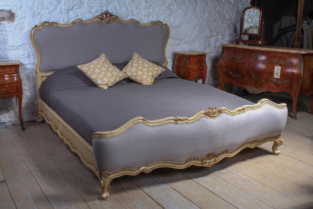 Fabulous Italian Carved painted newly upholstered large king size bed.