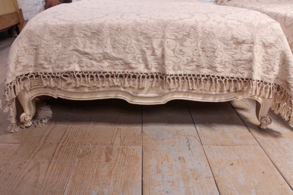 Pair of pretty French low end single upholstered beds View II