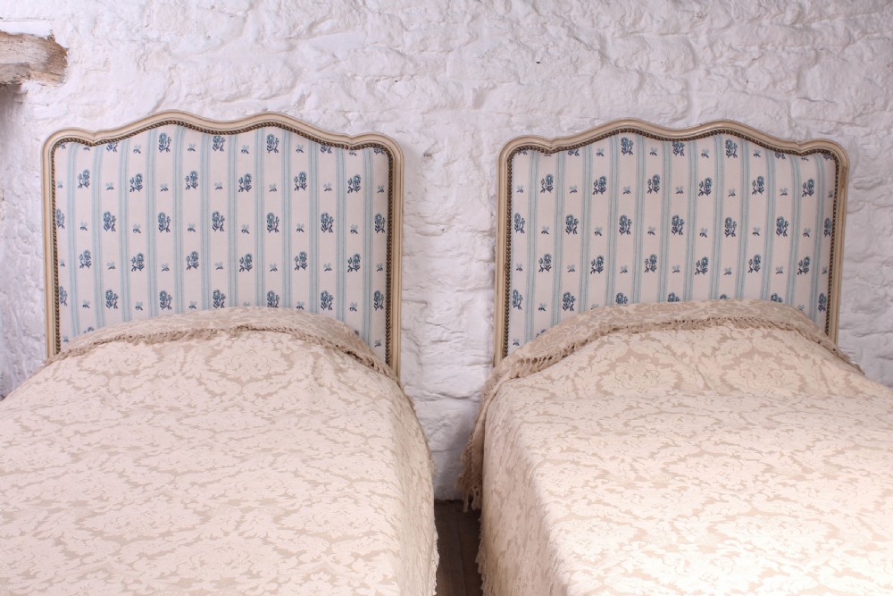 Pair of pretty French low end single upholstered beds View V