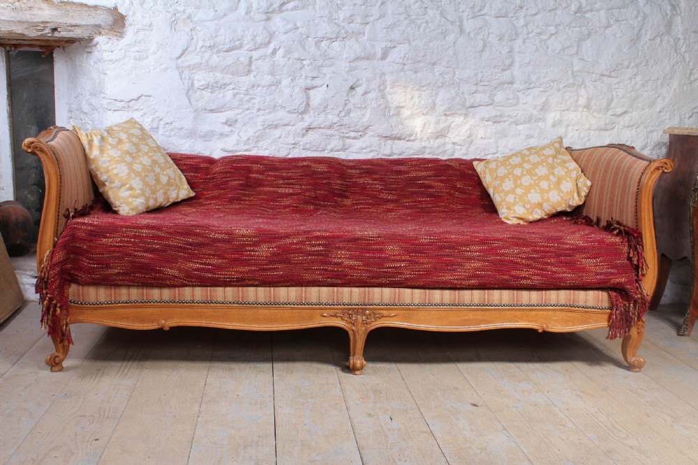 Newly upholstered Louis XV style day bed.
