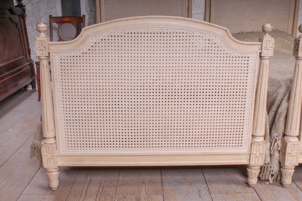 Pretty pair of French painted caned single beds View IV
