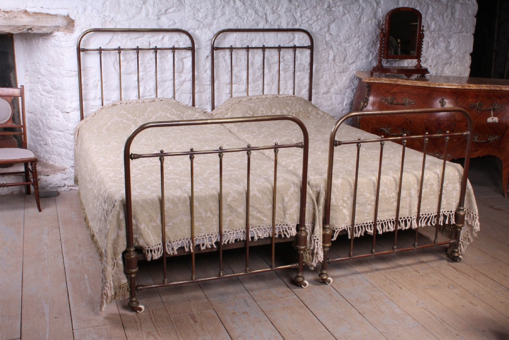 Attractive pair of French aged brass single beds