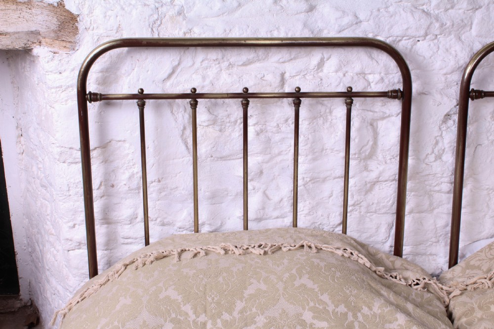 Attractive pair of French aged brass single beds View V