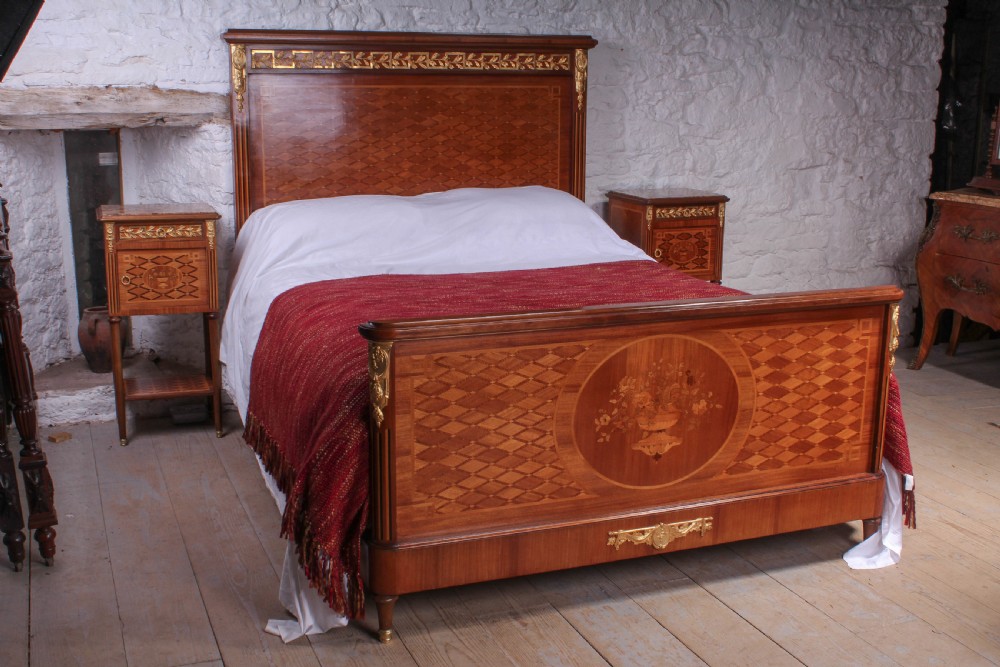 Beautiful fruit wood and ormalu king size bed with matching bedsides 