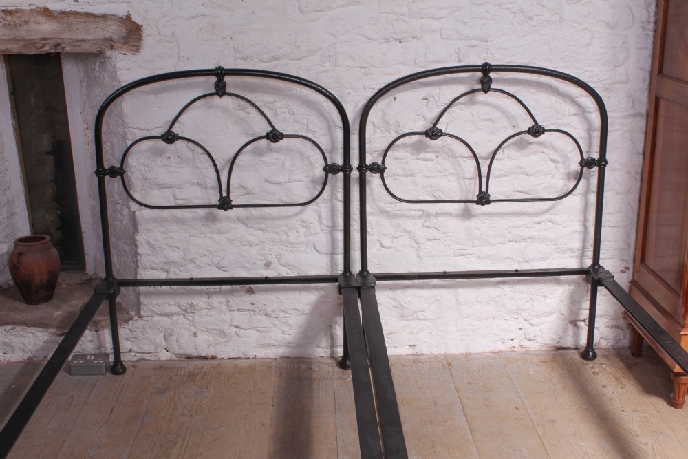 Attractive pair of black Irish iron single beds (can be joined) View IX