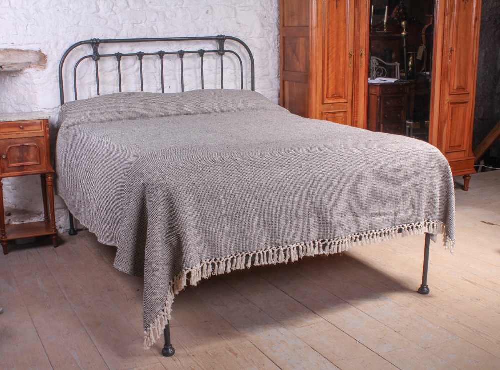 Pleasingly simple all iron king size bed