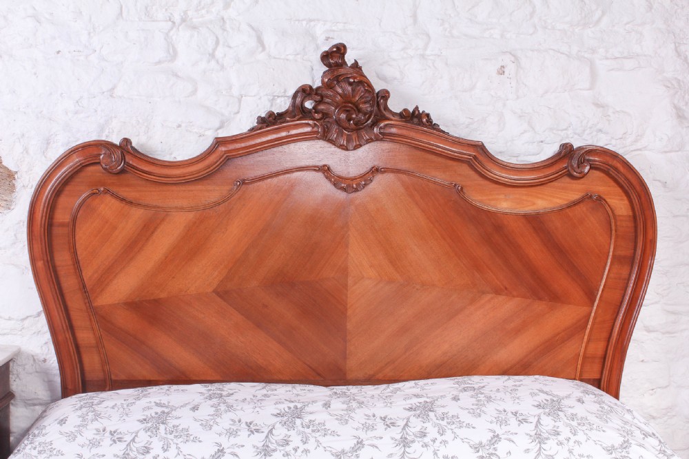 Lovely carved walnut Louis XV style double bed View VIII