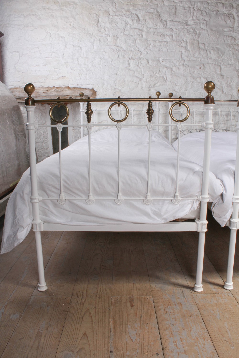 Pretty pair of single white and brass beds with rings and spindle details (can be joined) View II