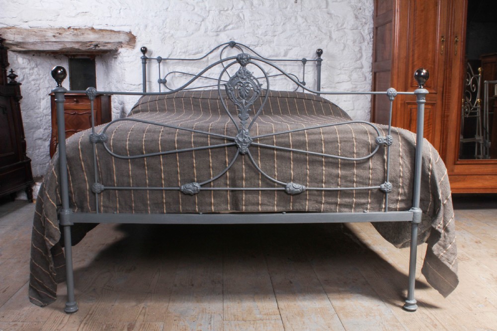 Pretty early Victorian double brass and iron bed View VI