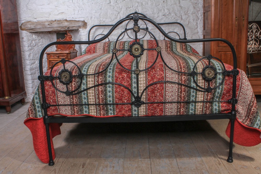 Lovely early Victorian iron and brass 5Ftking size bed View II