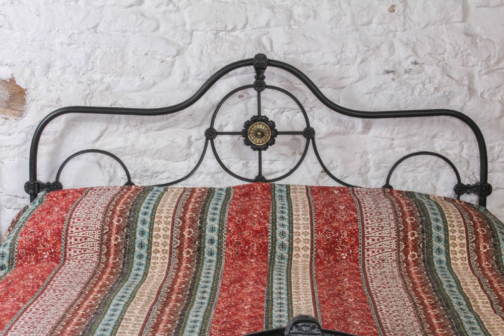 Lovely early Victorian iron and brass 5Ftking size bed View III