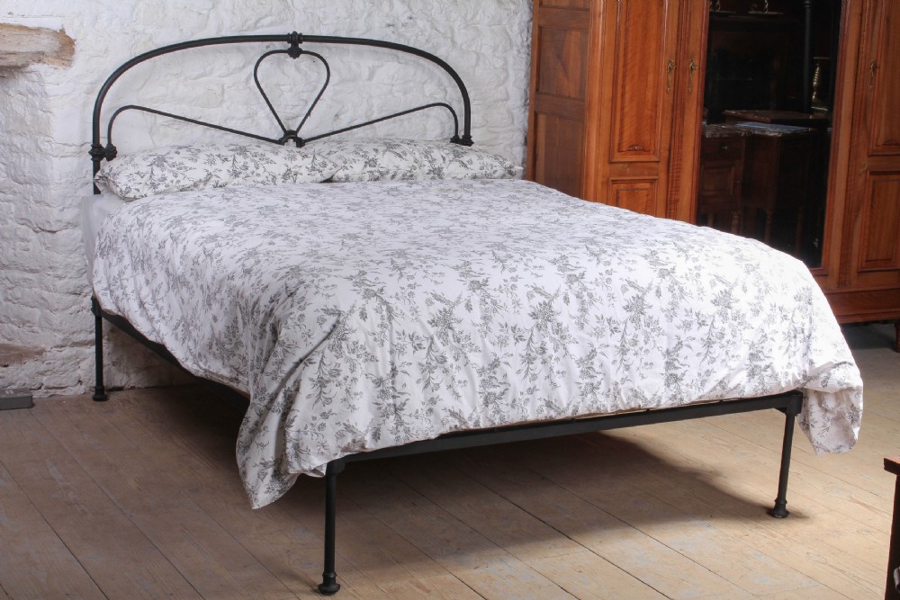 Pleasing All iron Irish king size no end bed
