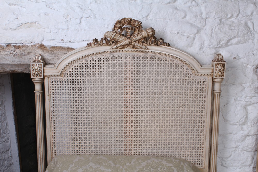 Striking pair of French Empire style caned single beds View III