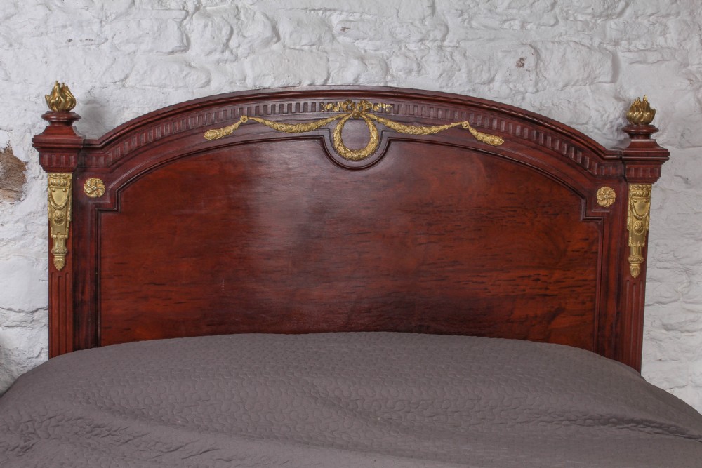 Magnificent Louis XV1 style bed with flame mahogany panels View III