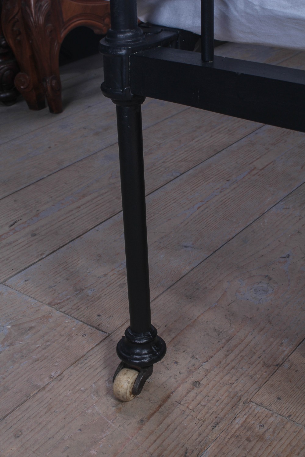 Pleasingly simple early Victorian brass and iron king size bed with forged iron panel View V