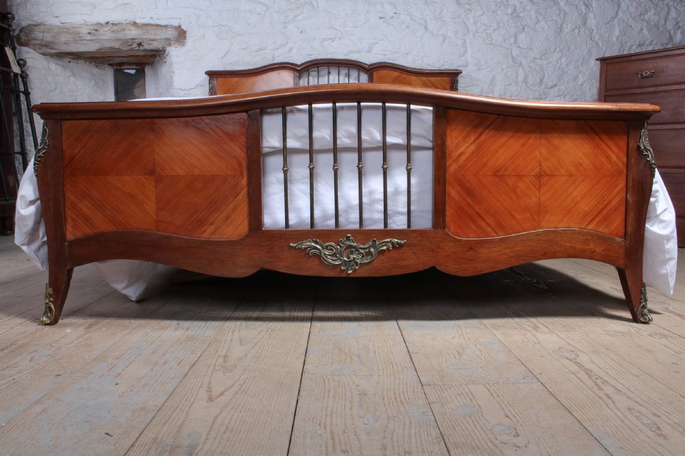 Unusual low height walnut veneer king size bed View IV