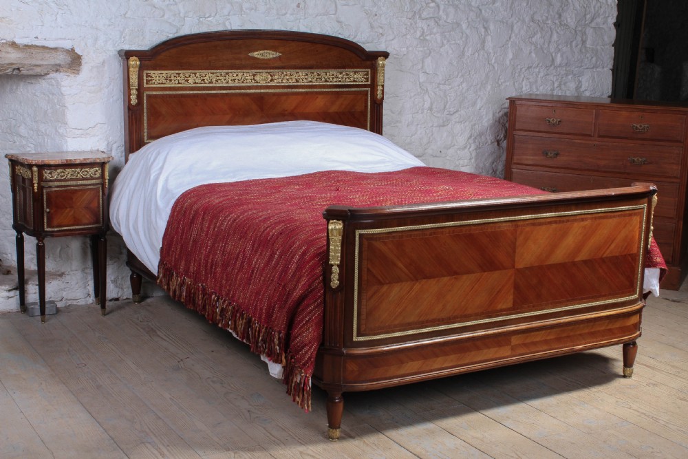 Fabulous mahogany and walnut decorated Empire style king size bed and bedside