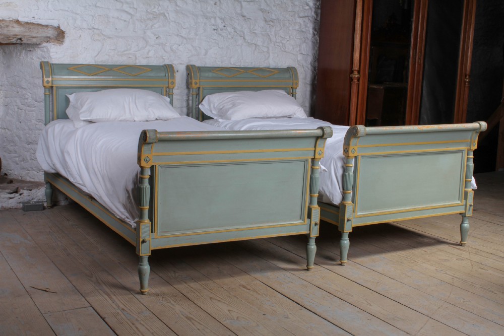 Matching pair of painted French Directoire single beds