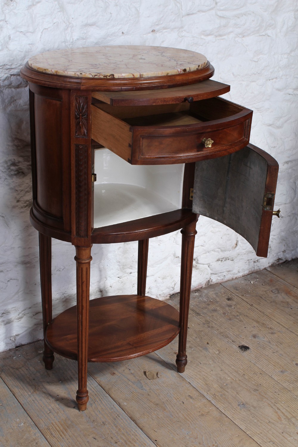Beautiful pair of rare oval walnut bedsides View V