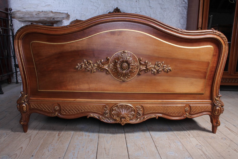 Beautiful solid walnut carved and gilded Louis XV style king size bed View VI
