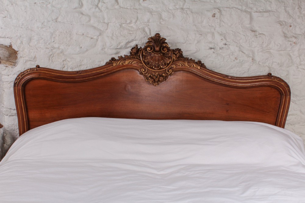 Beautiful solid walnut carved and gilded Louis XV style king size bed View VII