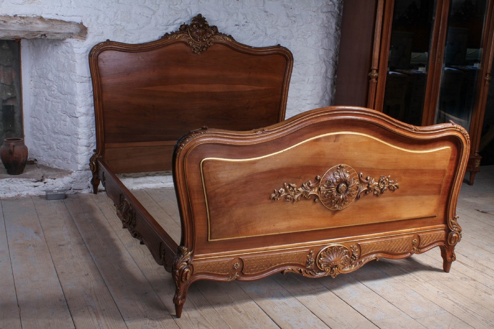 Beautiful solid walnut carved and gilded Louis XV style king size bed View IX