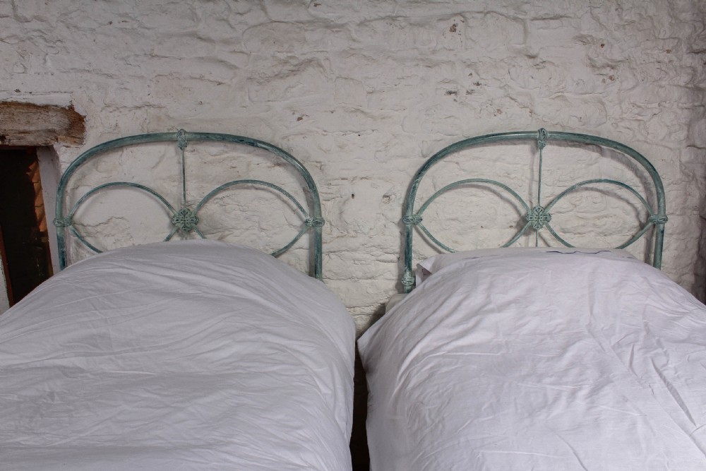 Lovely hand finished pair of iron single beds View VI