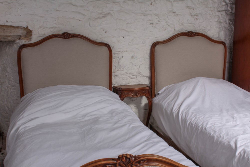Nice pair of newly upholstered Louis XV style beds View VII