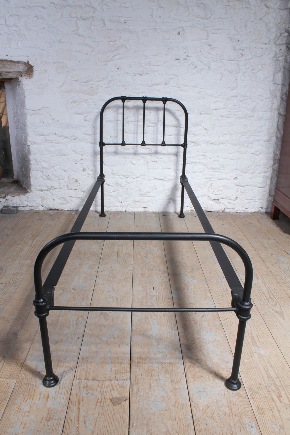 Small single utility iron bed View V