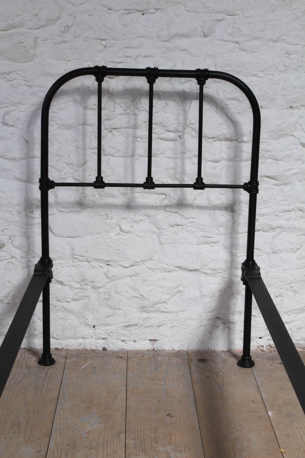 Small single utility iron bed View VI