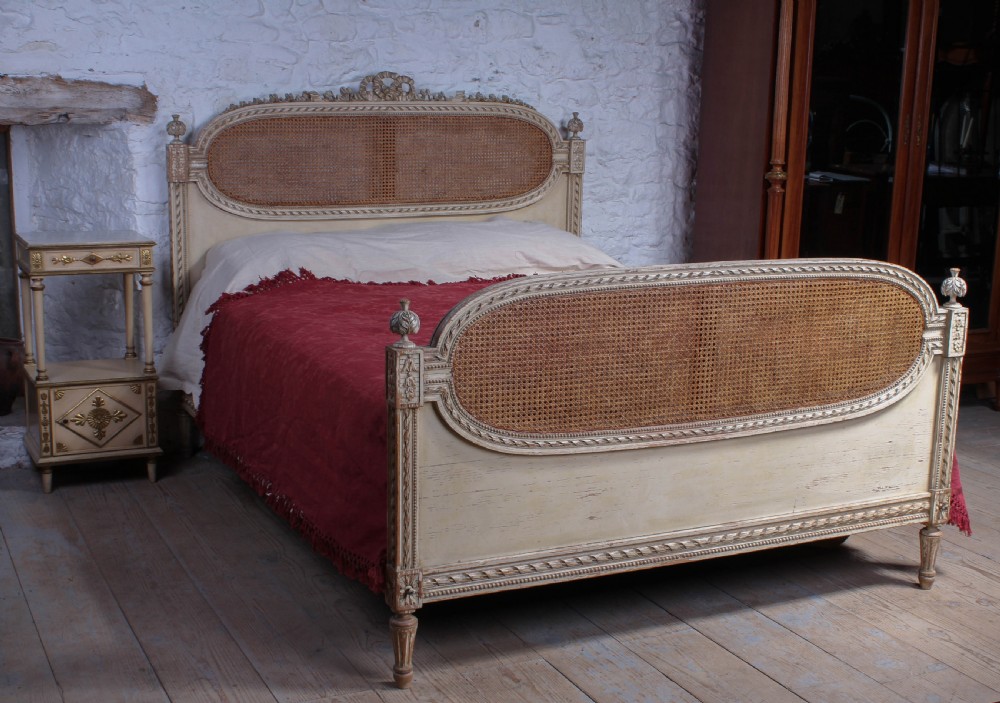 Fabulous French carved and caned king size bed
