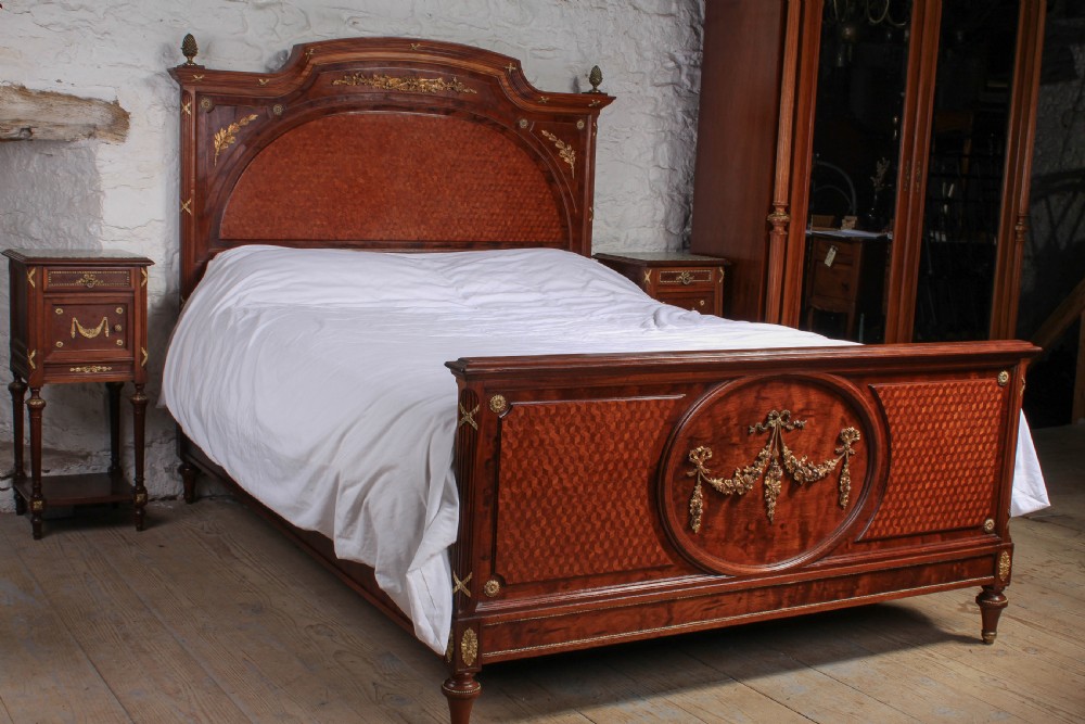 Handsome Mahogany and fruit wood king size bed with matching bedsides 