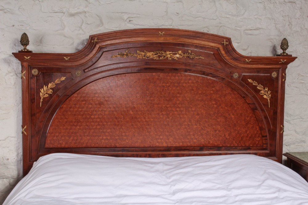 Handsome Mahogany and fruit wood king size bed with matching bedsides  View III
