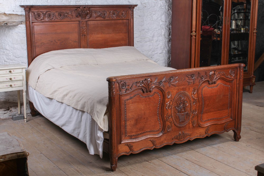 Lovely French provincial carved oak king size bed