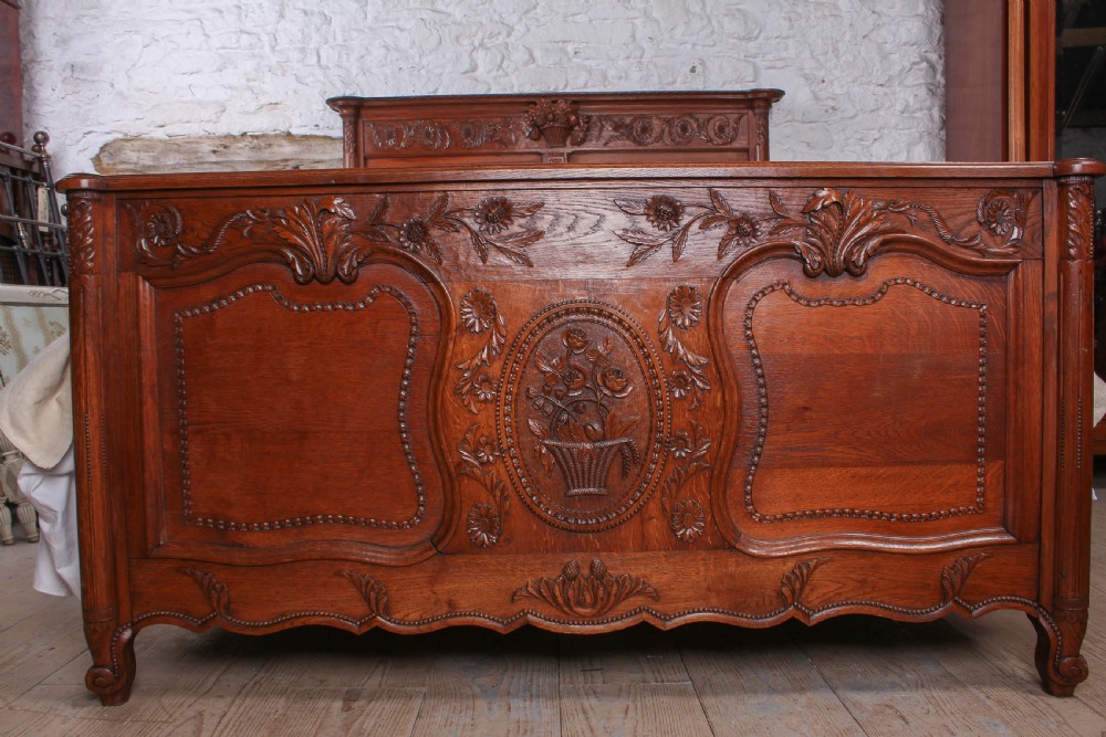Lovely French provincial carved oak king size bed View VIII