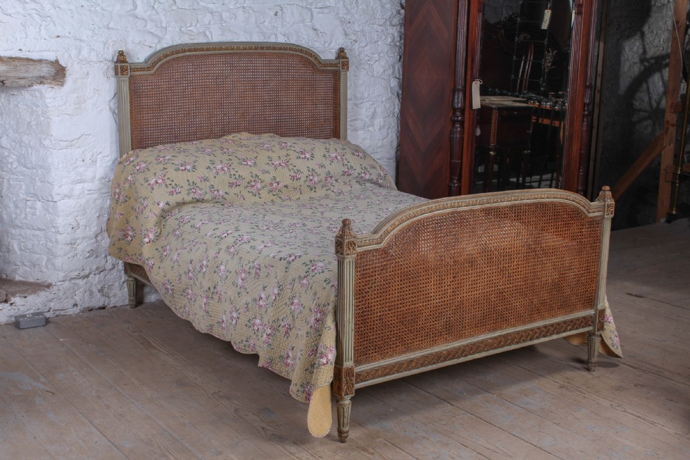 Attractive carved caned French double bed