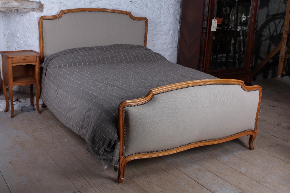 Newly upholstered Louis XV style king size bed
