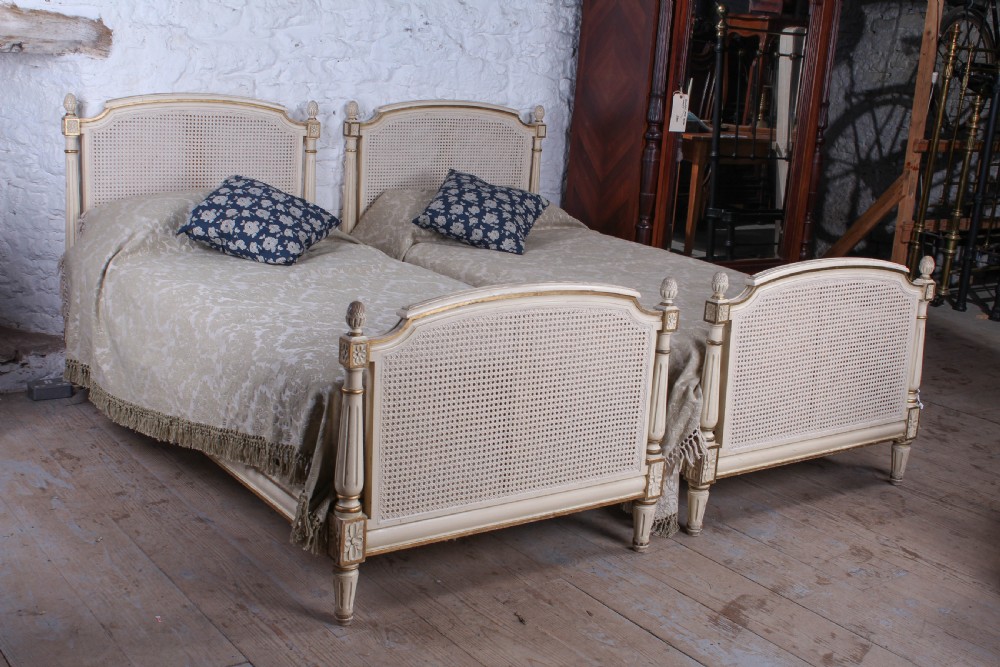 Pretty pair of French painted caned single beds View II