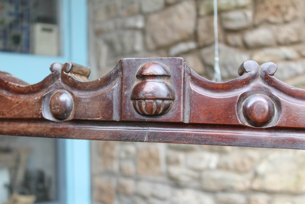 Circular mahogany ciel de lit with carved detail View III