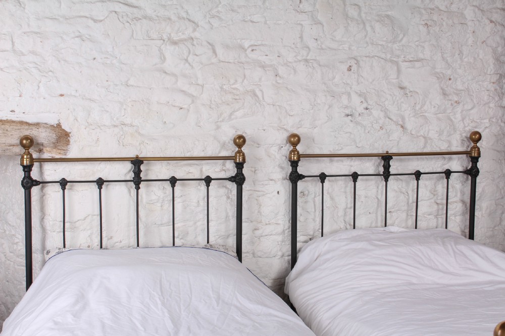 Lovely matching  pair of classic Victorian single beds View V