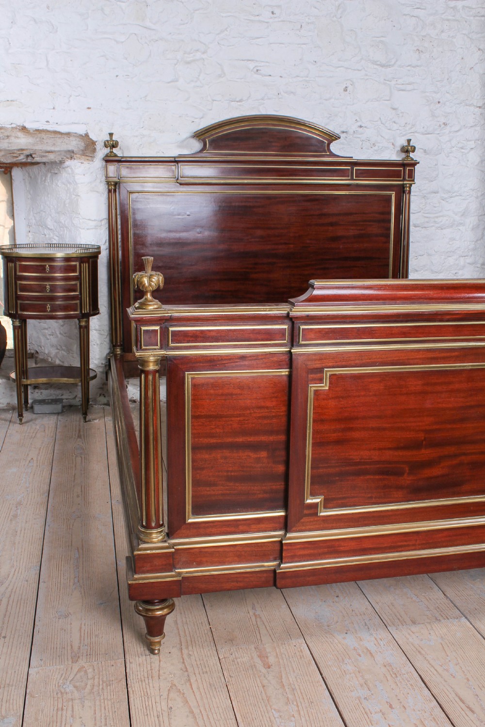 Very handsome mahogany king size bed and matching bedside View III