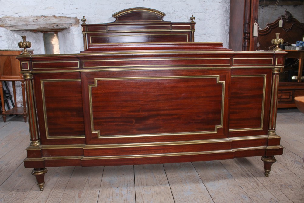 Very handsome mahogany king size bed and matching bedside View VII
