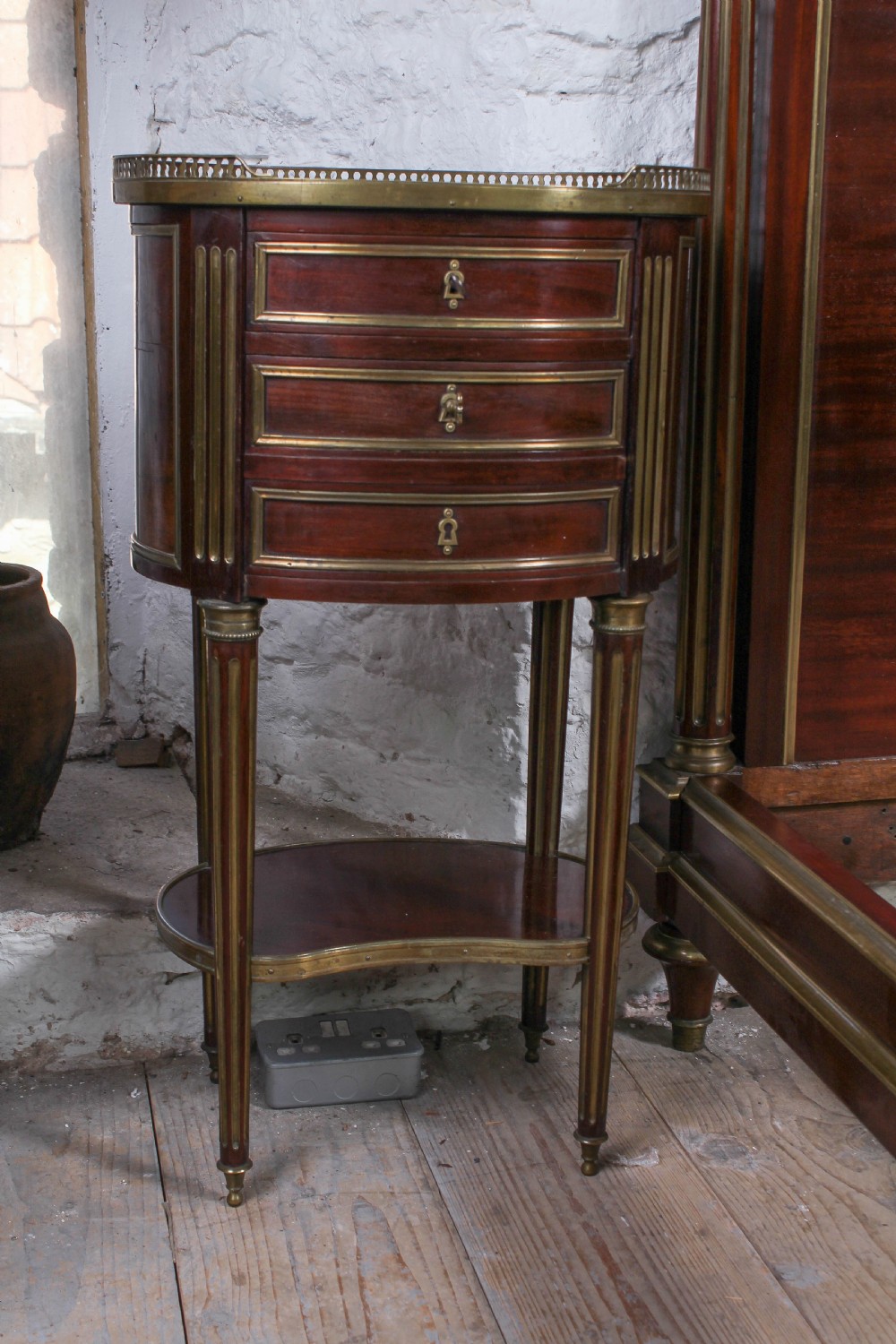 Very handsome mahogany king size bed and matching bedside View IX