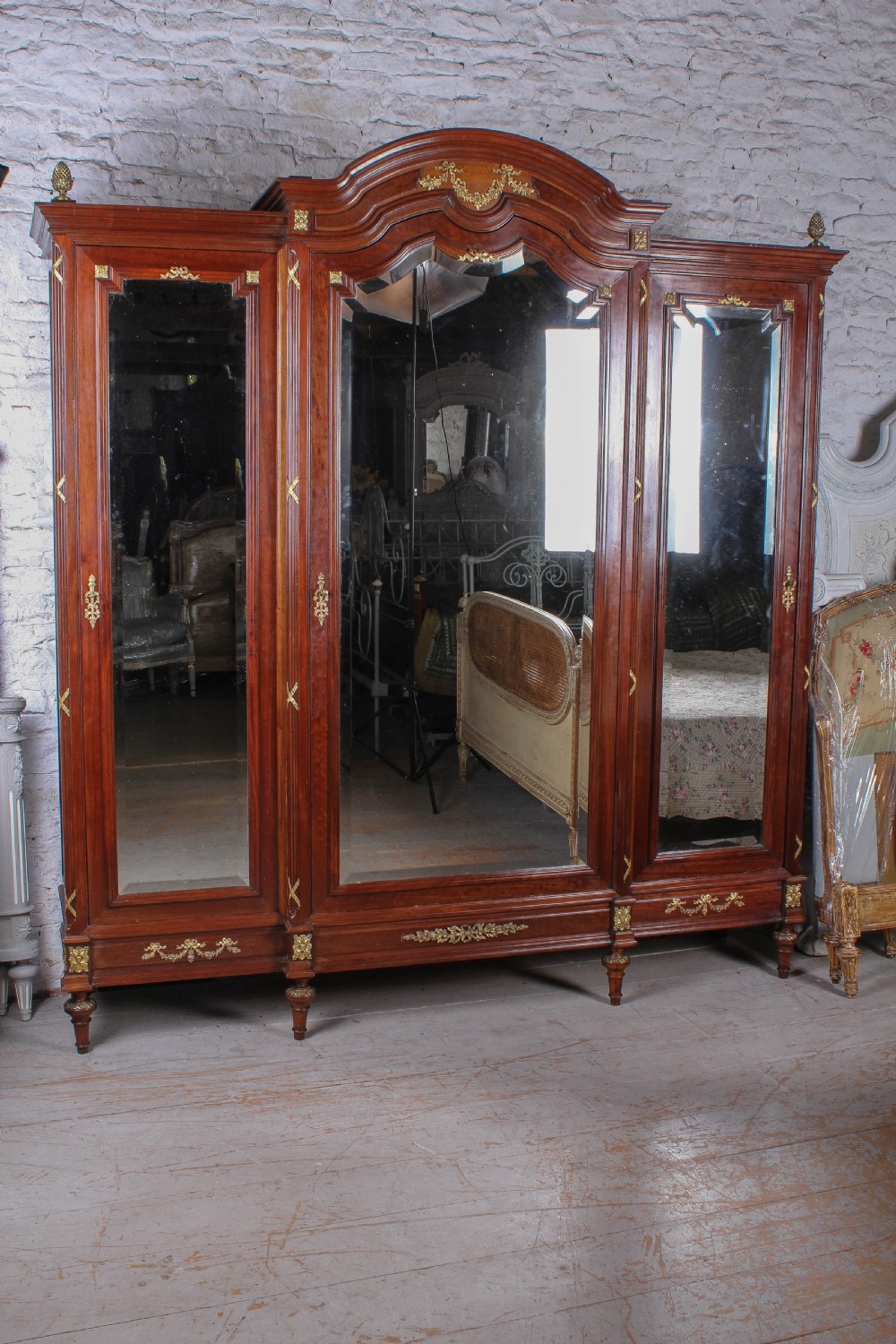 Magnificent mahogany and fruitwood three door armoire View II