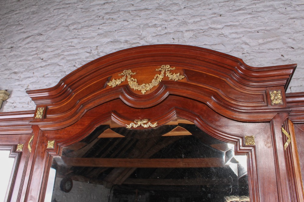 Magnificent mahogany and fruitwood three door armoire View V