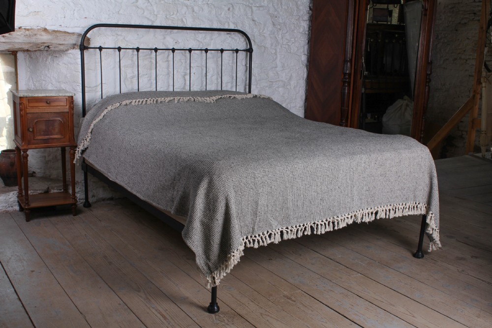 Pleasingly simple all iron king size bed
