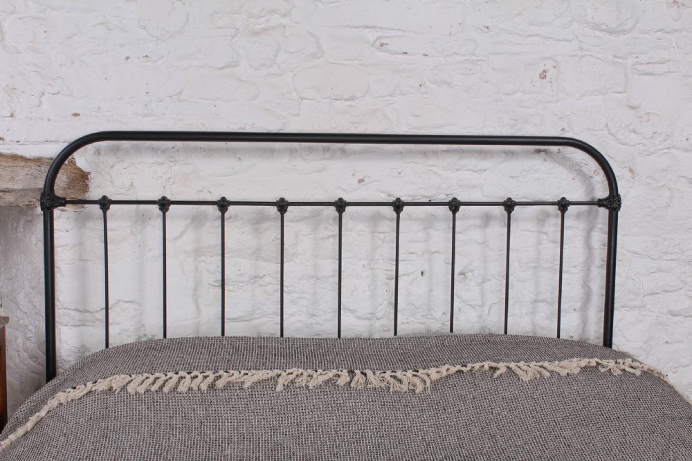 Pleasingly simple all iron king size bed View II