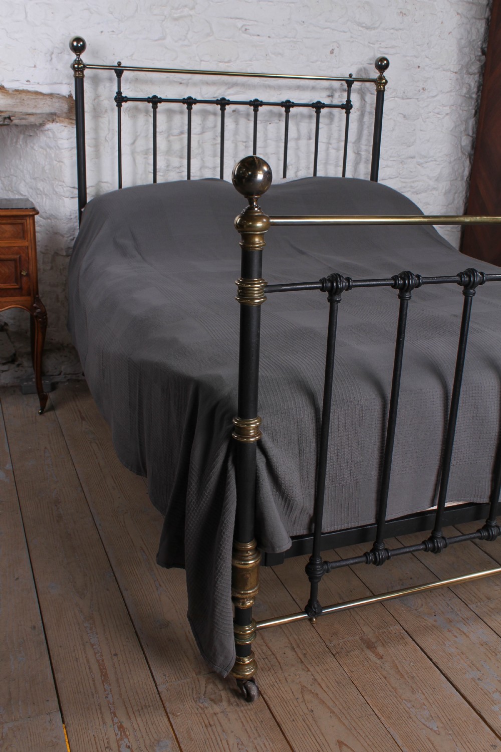 Handsome individual Victorian king size brass and iron bed View V