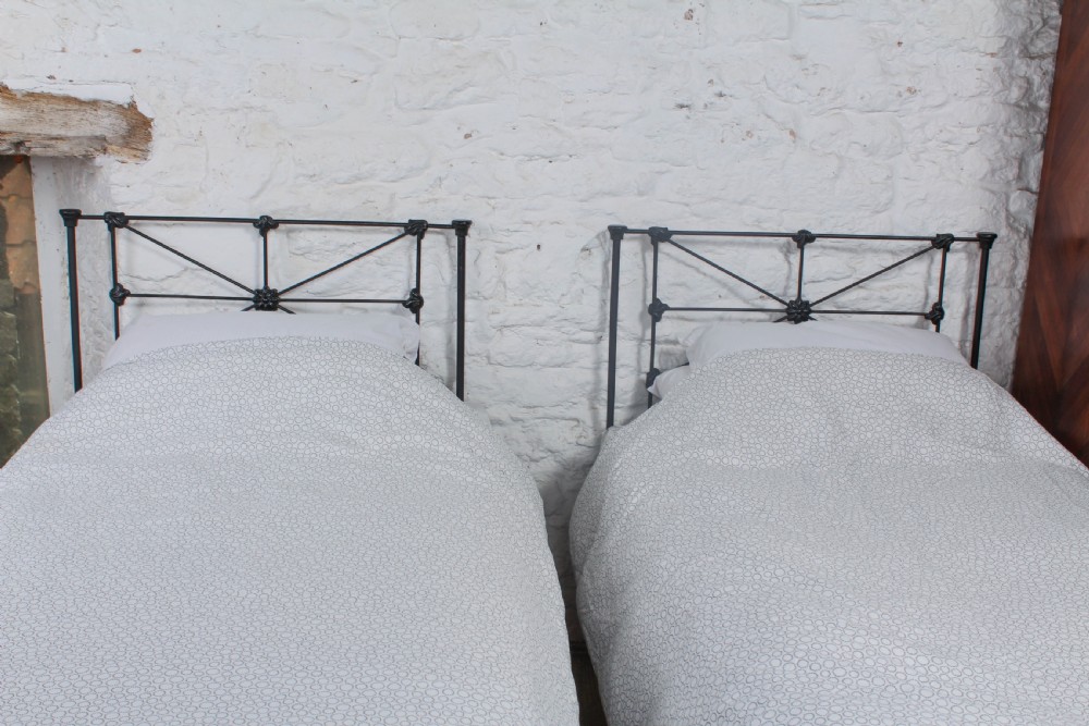 Simple pair of Victorian all iron single beds (can be joined) View IV