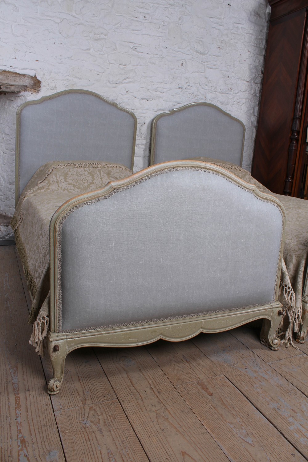 Nice pair of painted upholstered Louis XV style single beds View II